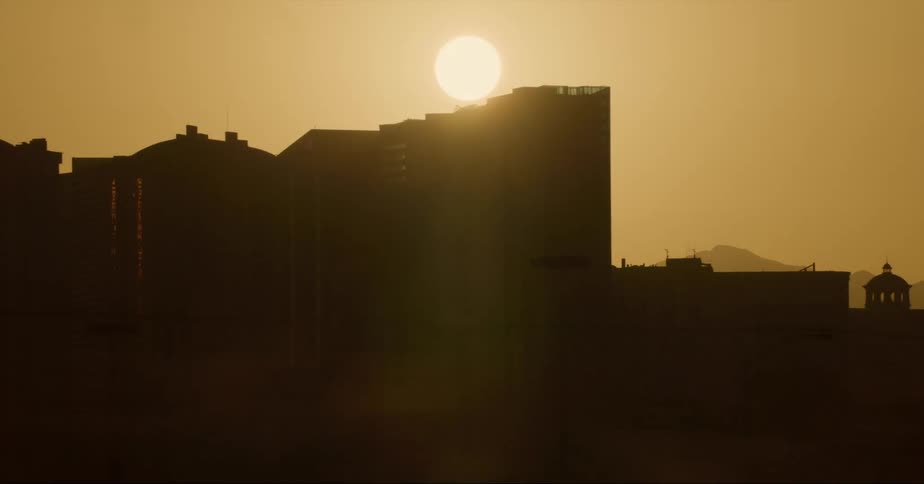 A large hotel is visible from the freeway