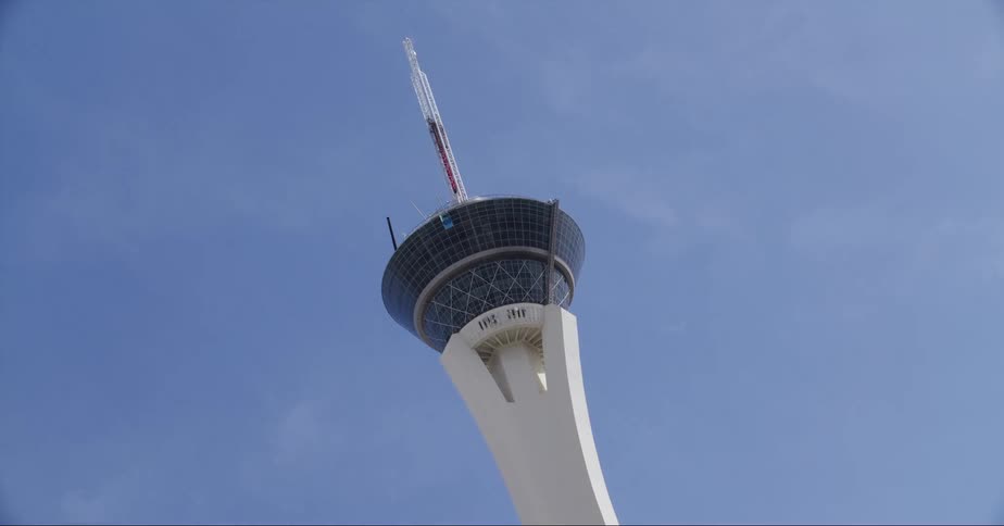 The stratosphere tower in las vegas seen from a moving vehicle at daytime