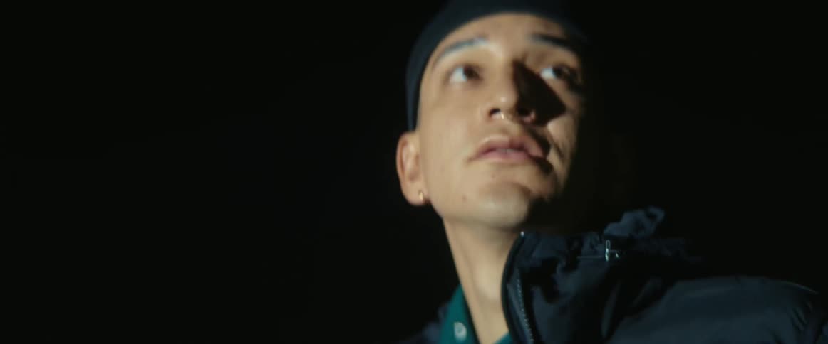 A man looks around at night