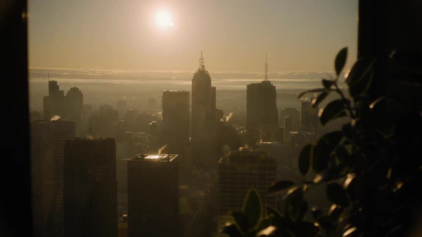The sun sets over the city