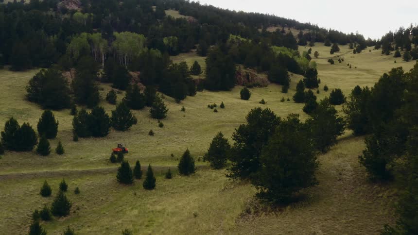 An atv driving across land