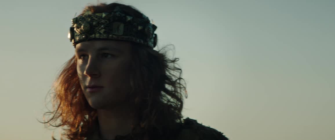 A king is walking outside