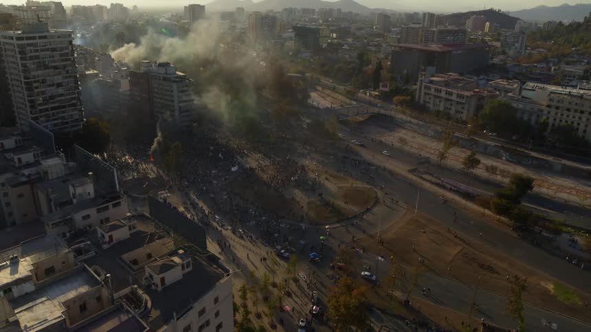 Large mob protests in the streets of Santiago