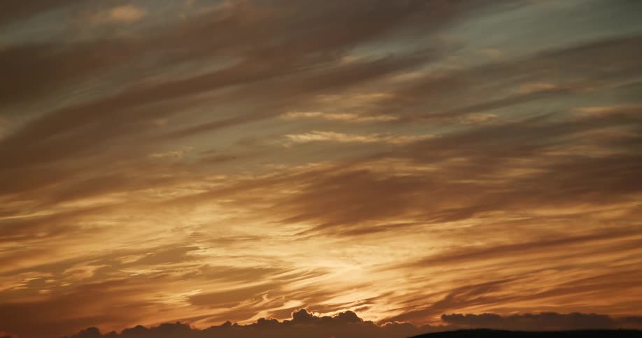 Landscape of setting sun and clouds
