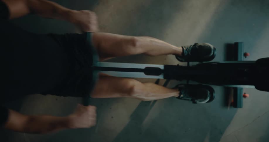 A man is working out on an exercise machine