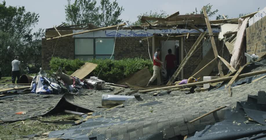 People clean up after a disaster