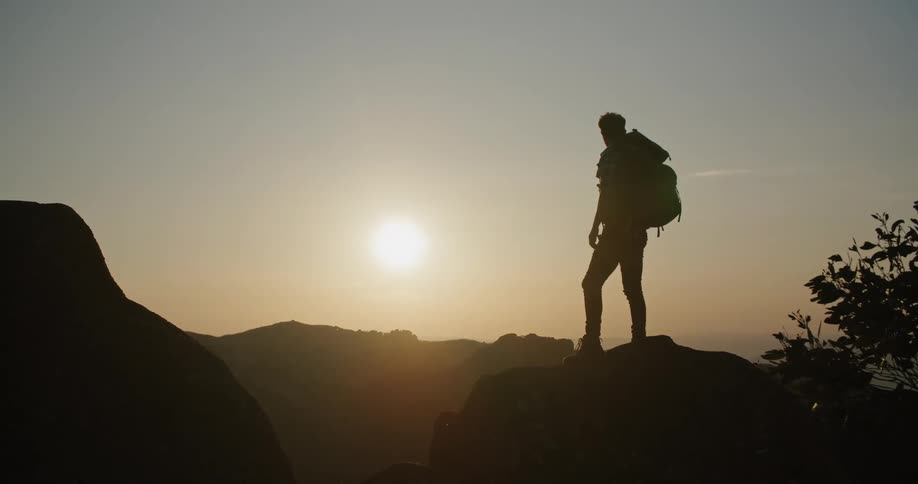 A man hiking along a ridge