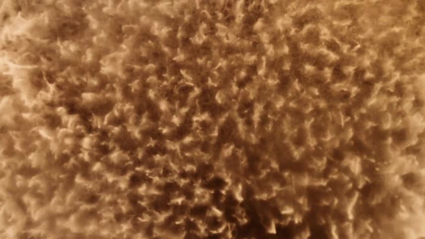 Abstract beige clusters flicker and strobe