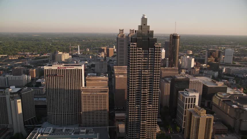 A breathtaking aerial view of Downtown Atlantas skyscrapers reveals a metropolis of towering structures including SunTrust Plaza Bank of America Plaza and Westin Peachtree Plaza Hotel