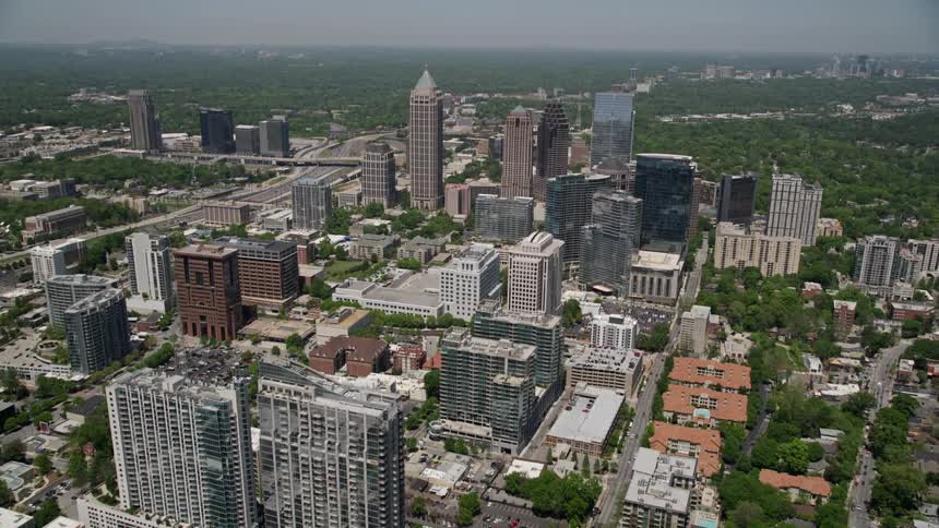 A stunning aerial view of the towering skyscrapers of Midtown Atlanta Georgia on a sunny day