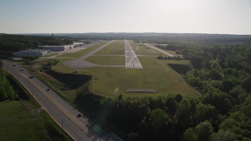 A plane approaches Fulton County Airport runway in Georgia during the daytime