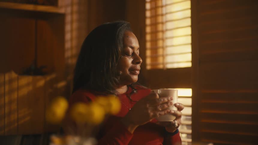 A woman drinking coffee