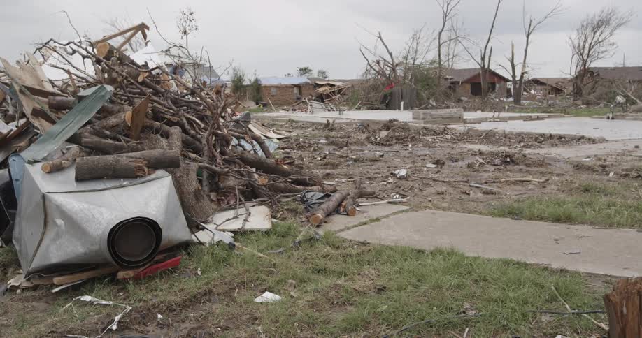 Houses are destroyed and debris is everywhere