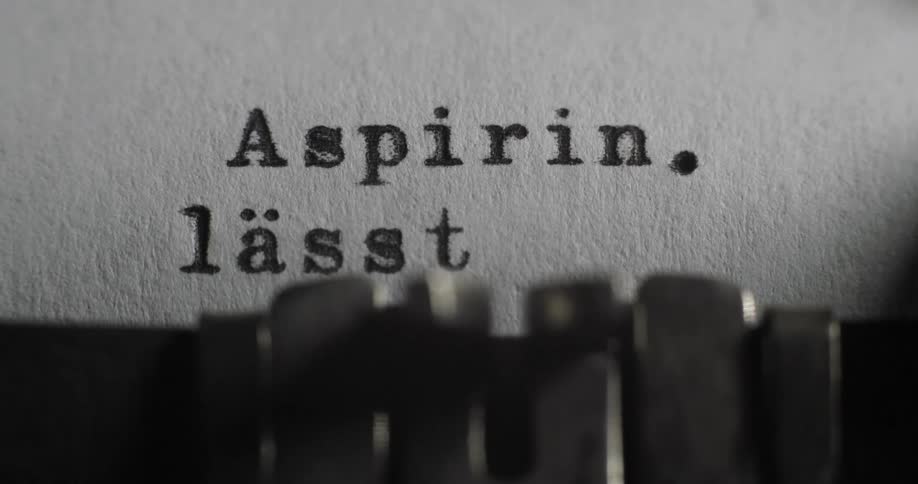 A typewriter is slowly typing out words