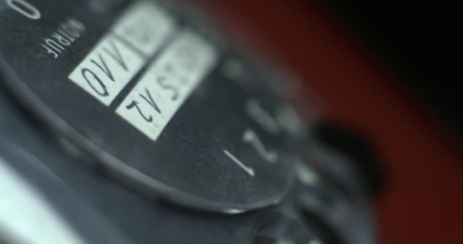 Someone dialing an old rotary phone