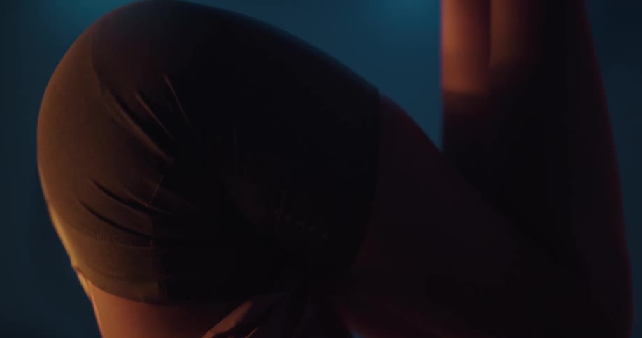 A woman stretching upside down