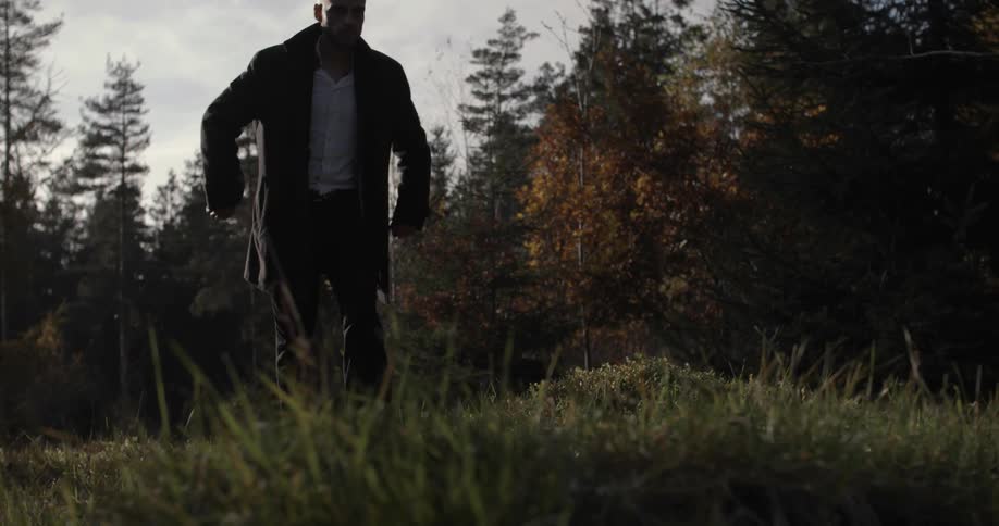 A man walking through a field