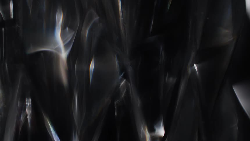 Smoke moves in a pattern like a kaleidoscope