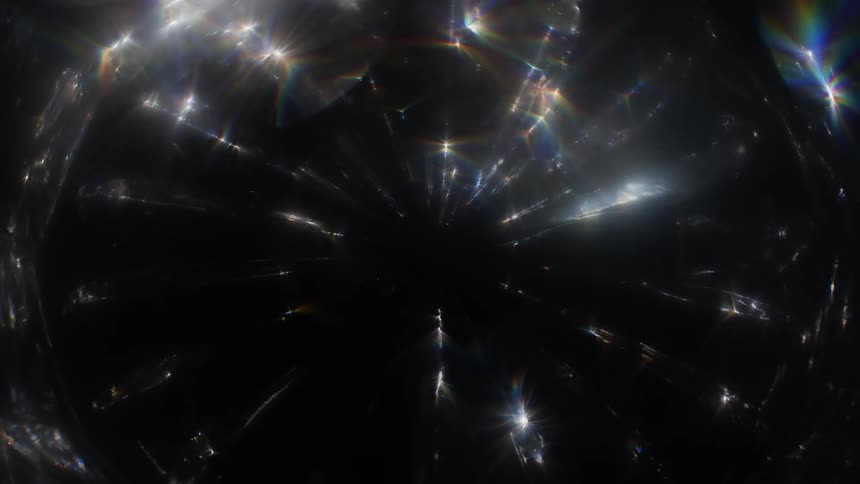 Glowing white lights in darkness