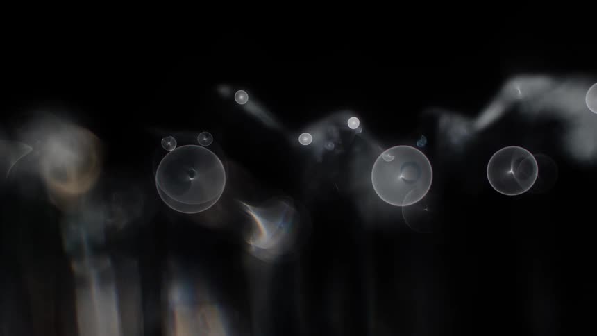 Glowing rotating orbs of light