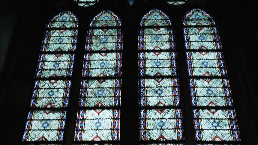 Large stained glass windows go all the way up