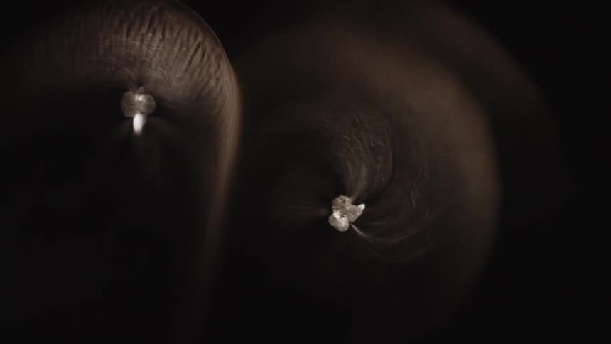 Brown swirling smoke with a cloud like center smoke