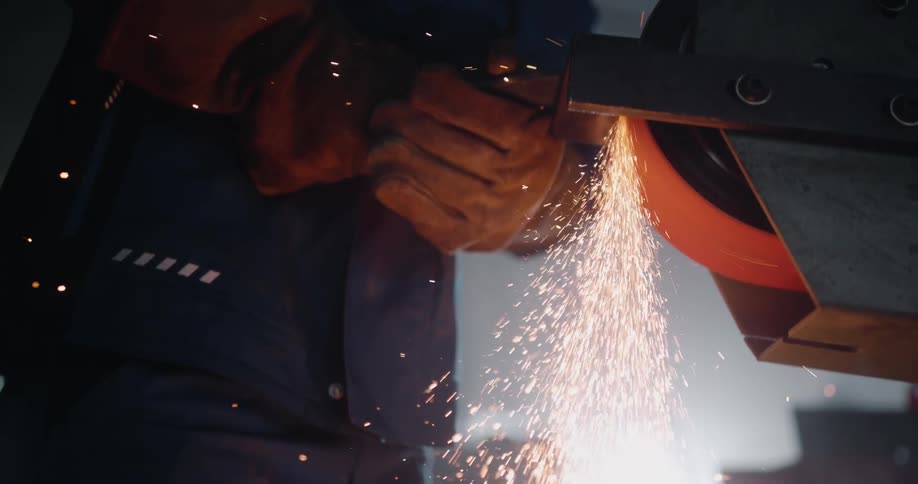 Sparks fly as a worker welds