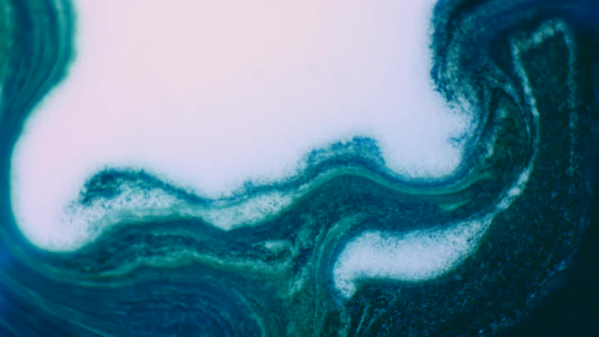 Abstract light blue and white liquids flows and swirl