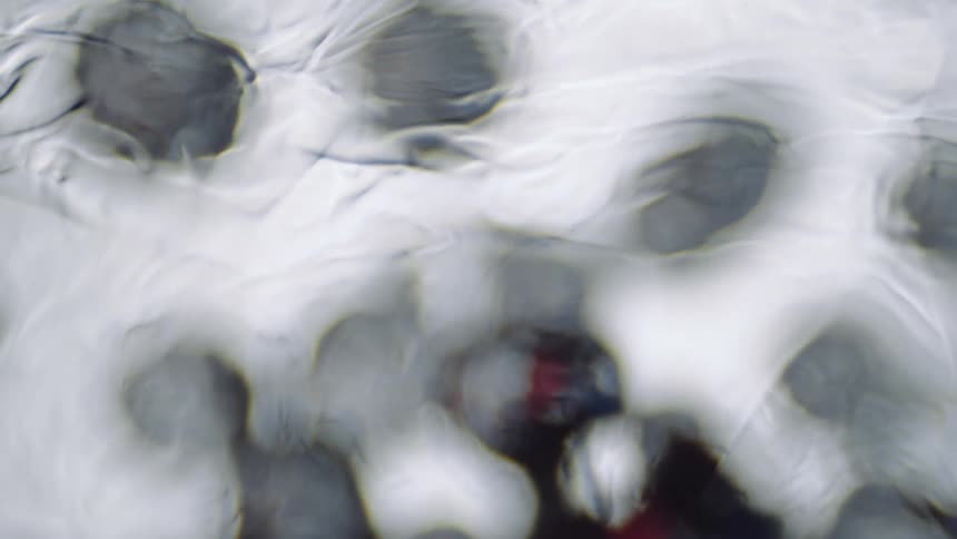 Water flowing over a reflection