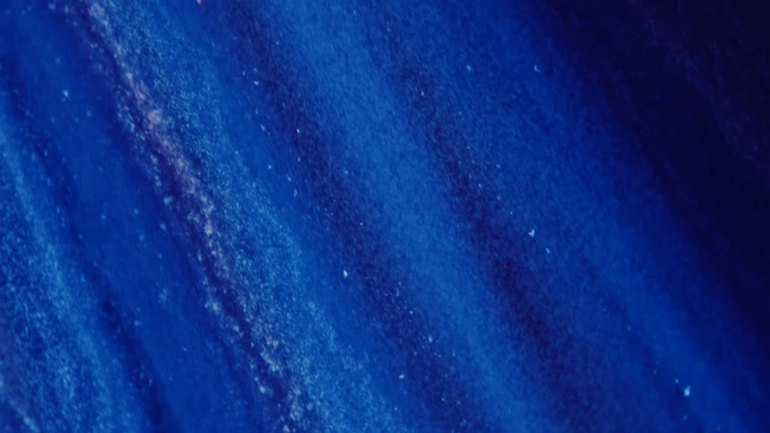 Abstract blue liquid flows down