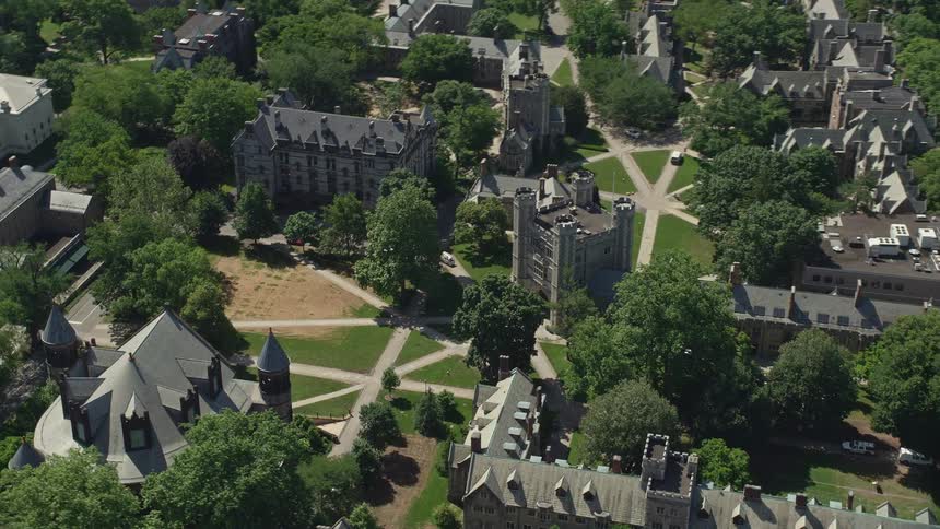 Aerial footage of Mathey College on the Princeton University campus during a sunny day in New Jersey