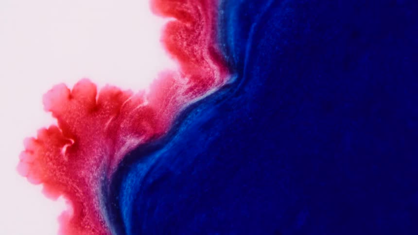 Flowing blue and red liquid
