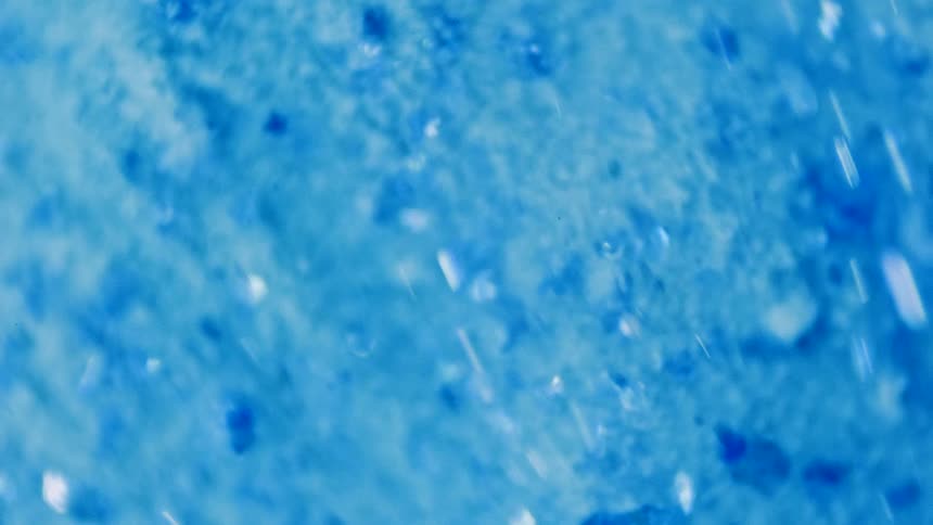 Flowing textured blue fluid