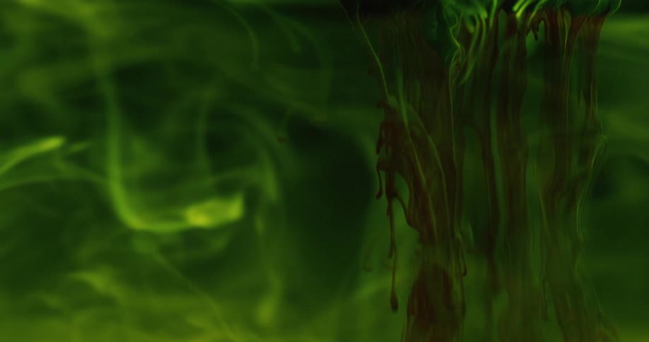 Flowing and swirling green liquid
