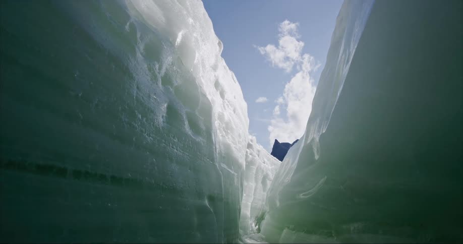 A view of a glacier and deep crevasse in the Arctic Ice Cap