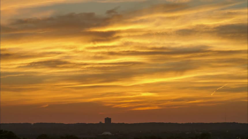 The sun sets over the horizon