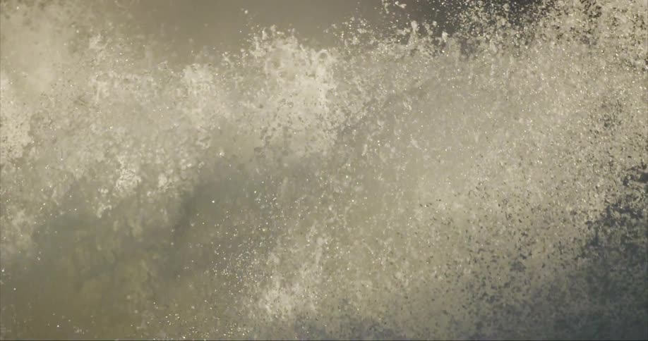 A massive exploding plume of fresh water in a slow motion waterfall magical moment