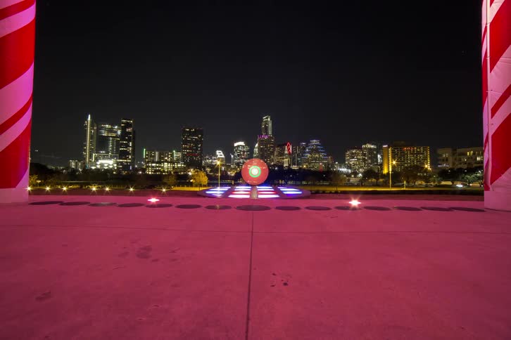 A glowing ball on a platform of flashing light