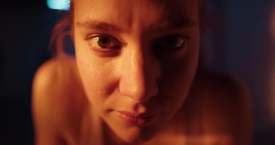 Burry picture is momentarily clear and shows smiling woman