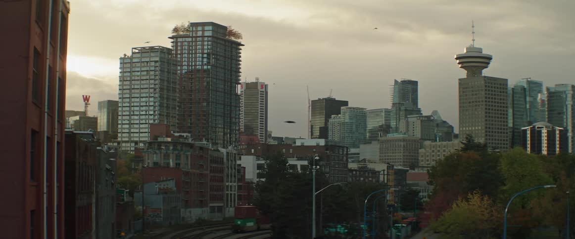 Vancouver's Gastown city skyline with tall buildings and trees surrounding