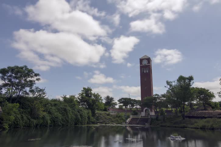Clouds roll over a clock tower