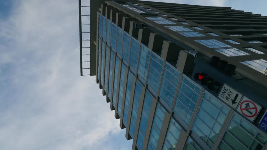 Drone flying through and taking a video of a building