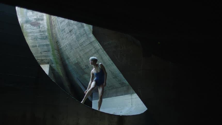 Woman moving between an space