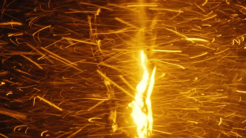 Sparks and a flame spiraling around