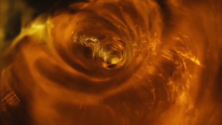 A swirling yellow golden vortex