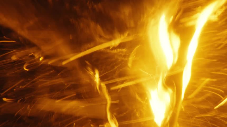 Flames and sparks spiraling around