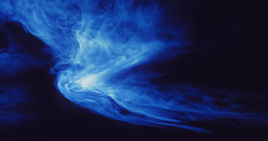 A blue smoky pattern moves in a swirl against a black background