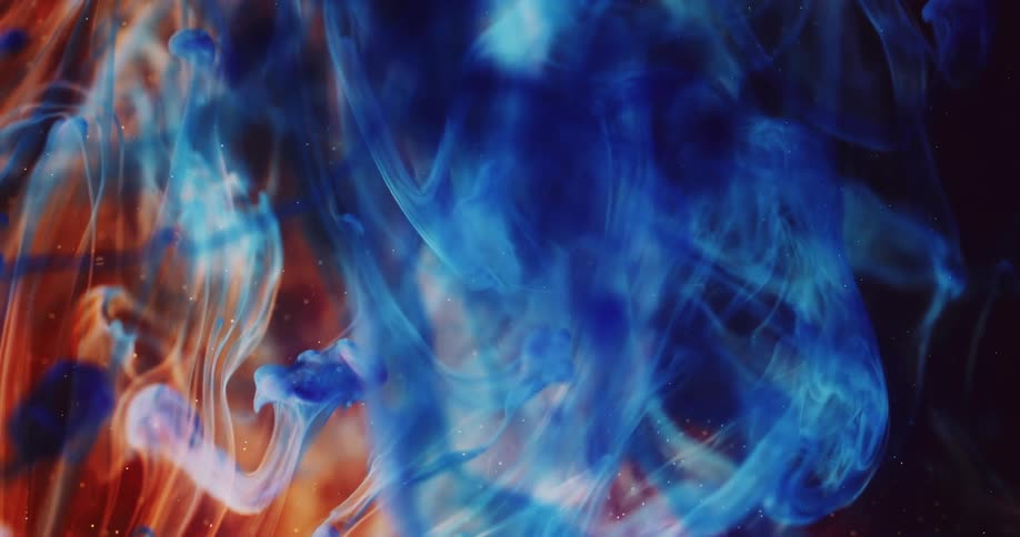 Swirling blue and red liquid