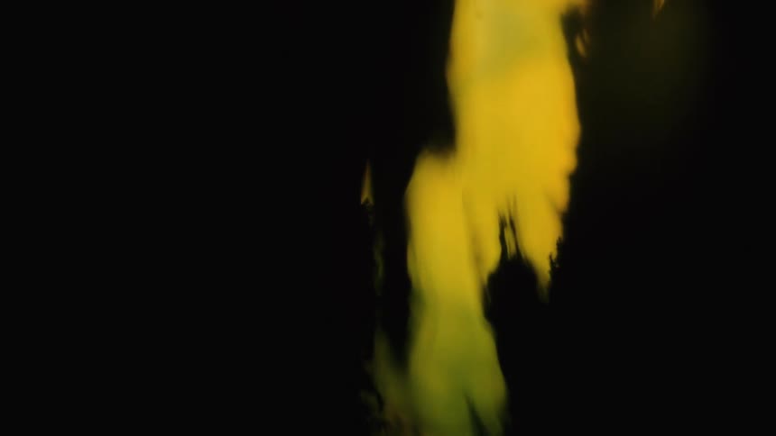 Rippling yellow and black liquid