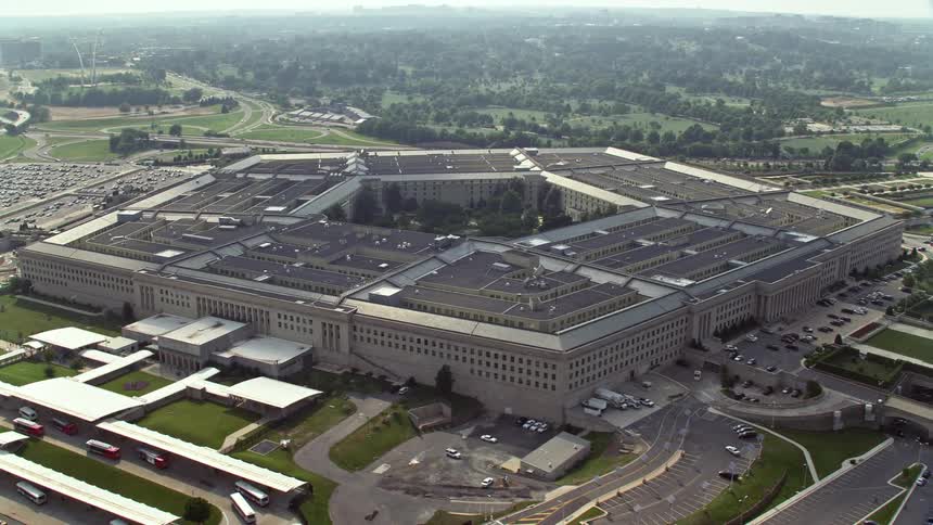 An aerial view of The Pentagon building in Washington DC with the Potomac River in the background shot on a sunny day during the summer